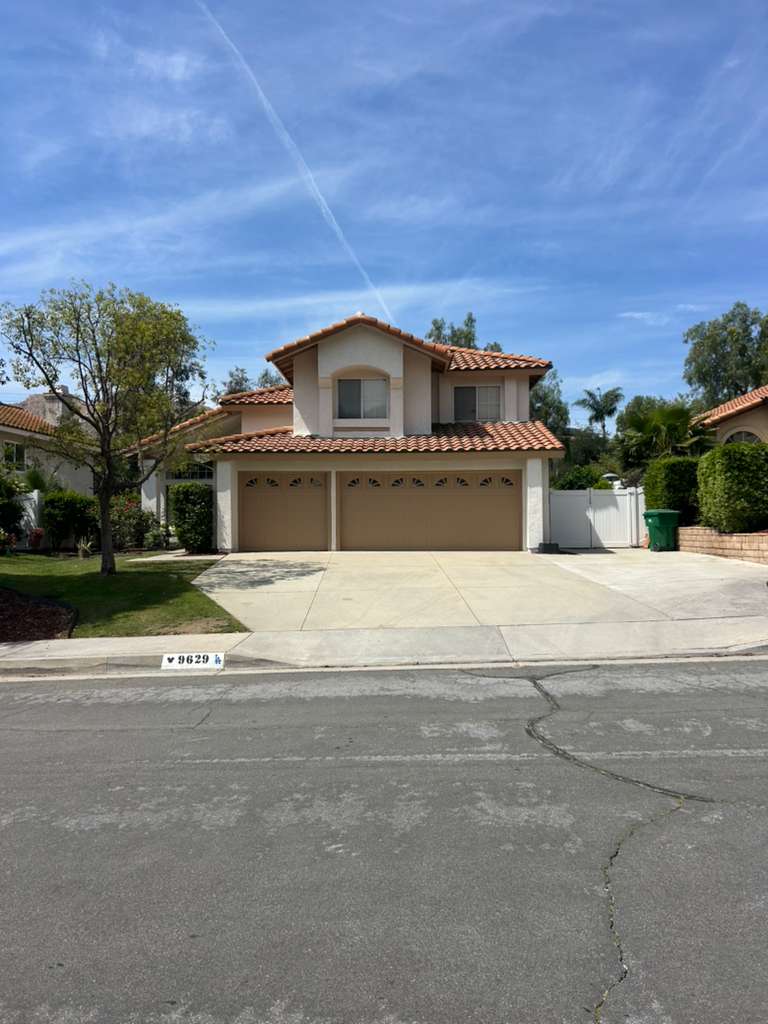 Full exterior repaint with clean stucco finish — Riverside, CA